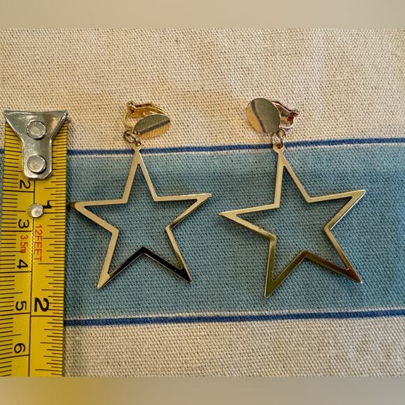 Gold Star Clip-on Earrings - Picture 2 of 3